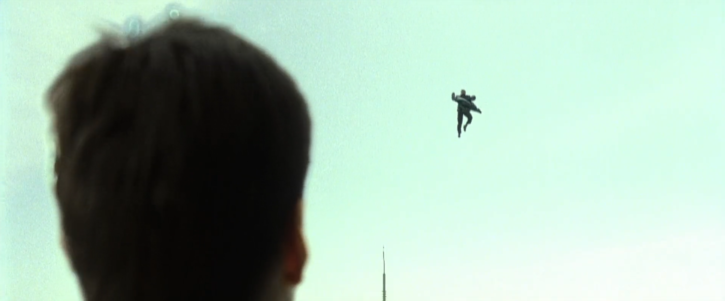 Neo watches Morpheus jump and land